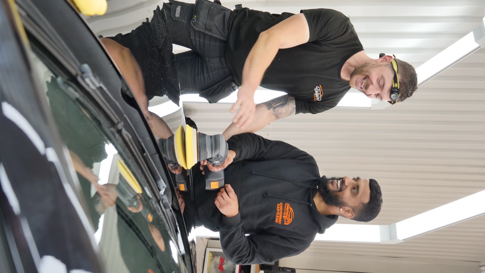 James and a trainee on a real customer car